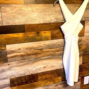 White Dress with adjustable Shoulders straps.